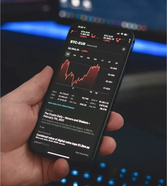 Smartphone displaying cryptocurrency price chart for BTC-EUR